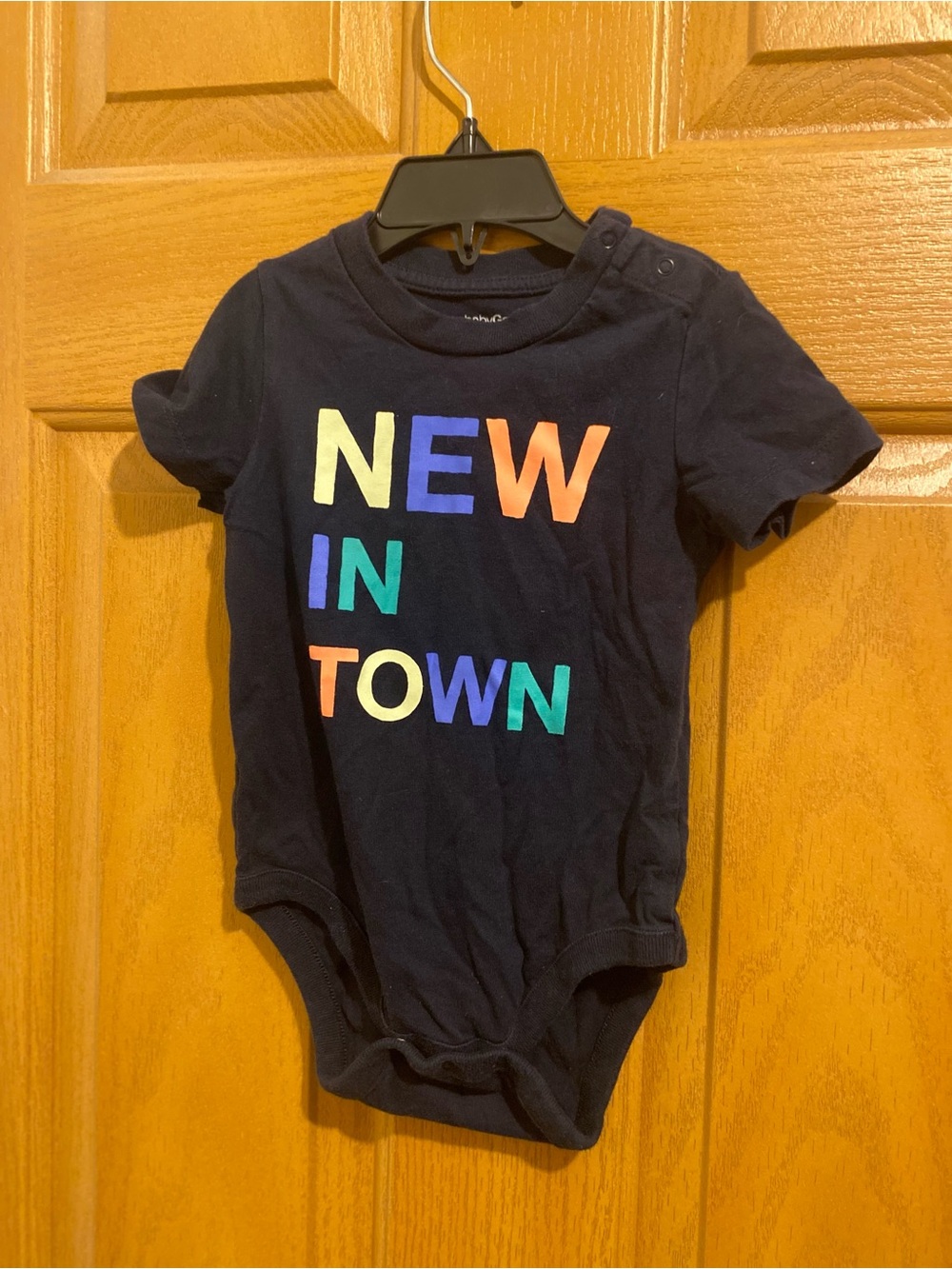 GAP Navy One-Piece Bodysuit with Multicolor "NEW IN TOWN" Print